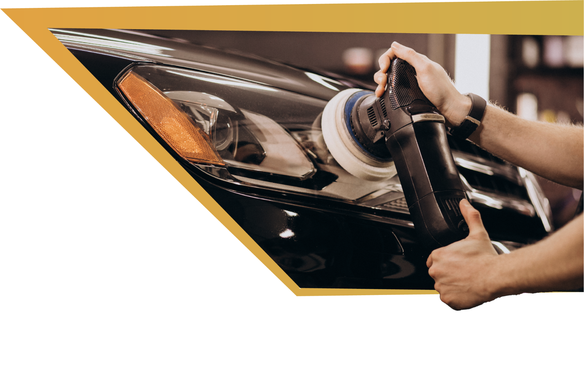 Detailer polishing a luxury car headlight