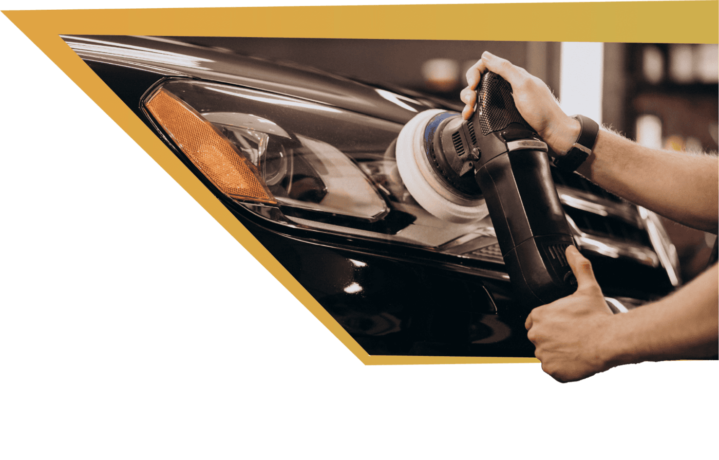 Detailer polishing a luxury car headlight